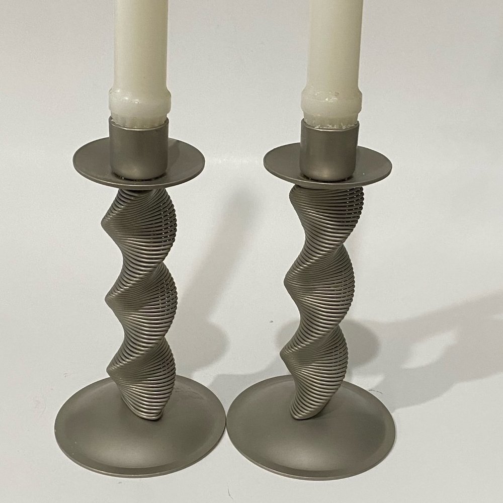 Twisted metal candle holders